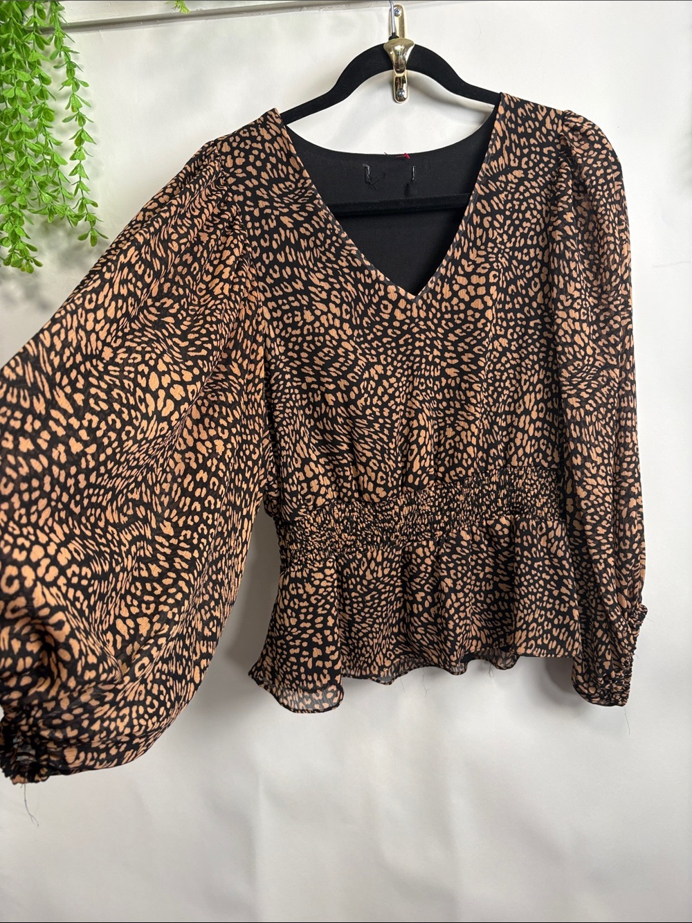 Source Unknown Black and Tan Animal Print V-Neck Smocked Peplum Blouse